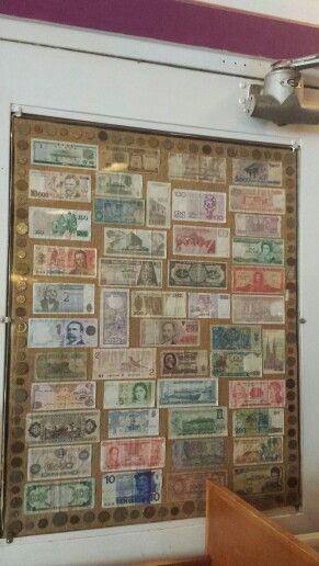 I saw this in a coffee shop, cool way to display foreign money that you can't bring yourself to get rid of. Displaying Money From Around The World, How To Display Foreign Currency, Money Collection Display, Money Display Ideas, Foreign Money Display Ideas, Foreign Currency Display Ideas, Foreign Money, Coin Frame, Coin Crafts