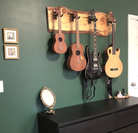 Raw wood guitar hanger live edge wood creative Live Edge Wall, Country Guitar, Guitar Wall Hanger, Epoxy Ideas, Wood Guitar, Guitar Hanger, Guitar Wall, Live Edge Wood, Raw Wood