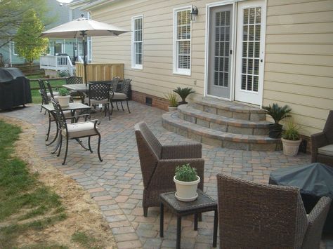 Cary NC cobblestone patio for entertaining Step Down Paver Patio Ideas, Stone Patio Steps From House, Paver Patio With Steps Down From House, Slider Steps To Patio, Stairs From Slider To Patio, Backyard Patio Steps, Back Patio With Steps Down From House, Stairs From Back Door To Patio, Paver Steps To Patio