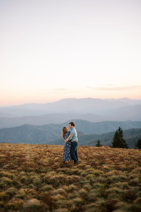 Discover the stunning allure of Roan Mountain engagement photos taken at the iconic Carver's Gap. Crafted by an award-winning Asheville wedding photographer, these images capture the raw, breathtaking beauty of the Appalachian Mountains like never before. Filled with adventurous and surreal photo ideas, these pictures embody love and nature in harmony. Uncover the magic yourself; see the photos now. Mountain Engagement Pictures, Roan Mountain, Mountain Engagement Photos, Engagement Photo Ideas, Surreal Photos, Asheville Wedding, Film Images, Mountain Photos, Adventure Photographer