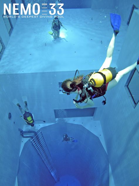 Bucketlist: Nemo 33 is the deepest pool in the world. Located in Brussels, Belgium. Its maximum depth is 113 ft! It contains 2.5 million liters of non-chlorinated, highly filtered spring water maintained at 86 °F and holds several simulated underwater caves at 33 ft. There are numerous underwater windows that allow outside visitors to look into the pool at various depths. And it costs roughly $28 for a dive. Done. Deepest Pool, Deepest Swimming Pool, Underwater Museum, Deep Pool, Amazing Swimming Pools, Diving Pool, Underwater Caves, Indoor Pools, Deep Diving