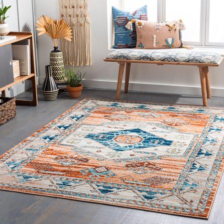 "The Tevazu Traditional Area Rug Collection features a central diamond motif and coordinating colors including blues, ivory, rust and tan. This collection stands its own remarkably against heavy foot traffic, spills, kids and pets, so you can place it in any room. That's because it's made of polypropylene fibers, which is one of the most durable materials. Rugs in this collection are made of medium pile and feel soft underfoot, making them perfect for living spaces and bedrooms. Machine made in Blue And Orange Rug, Cottage Rug, Light Blue Area Rug, Orange Rug, Cream Area Rug, Orange Area Rug, Rug Blue, Traditional Area Rugs, Unique Spaces