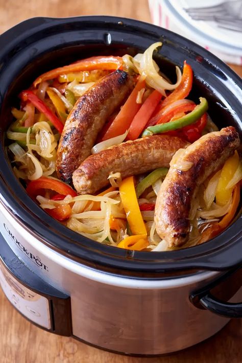 Recipe: Slow Cooker Sausages with Peppers and Onions | Kitchn Gungjung Tteokbokki, Sausage And Peppers Crockpot, Low Carb Slow Cooker Recipes, Sausage Peppers And Onions, Sausage Crockpot, Send Noods, Sausage Peppers, Low Carb Slow Cooker, Korean Rice