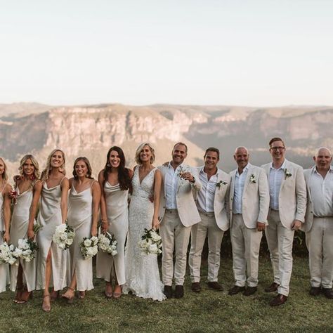 Cream Bridesmaid Dresses With Groomsmen, All Tan Wedding Party, All White Entourage, Gold And Green Bridal Party, Bridesmaid Dresses Matching Groomsmen, Bridesmaid And Groomsmen Outfits, Groomsmen Suit Colors, Greece Wedding Bridesmaid Dresses, Sand Groomsmen Suits