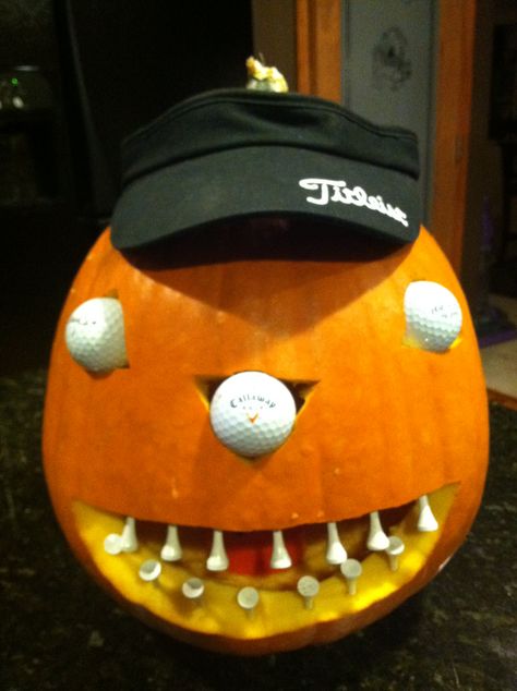 Golf themed pumpkin Golf Yard Decor, Trunk Or Treat Golf Theme, Golf Trunk Or Treat Ideas, Sports Pumpkin Carving, Inappropriate Pumpkin Carving, Golf Pumpkin Carving Ideas, Golf Ball Pumpkin, Golf Pumpkin, Pumpkin Golf