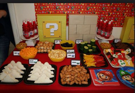 Mario party food table. Nintendo Birthday Party, Super Mario Brothers Party, Super Mario Brothers Birthday, Mario Brothers Birthday Party, Mario Kart Party, Mario Bros Birthday Party Ideas, Nintendo Party, Mario Theme, Super Mario Bros Birthday Party