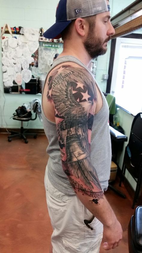 American themed tattoo Eagle Upper Arm Tattoo, American Themed Tattoo, Mens Half Sleeve Tattoo Upper Arm, Patriotic Tattoos Sleeve For Men, America Tattoos For Men, Patriotic Tattoos Sleeve, Western Sleeve Tattoo For Men, Patriotic Sleeve Tattoos For Guys, Usmc Tattoo Sleeve