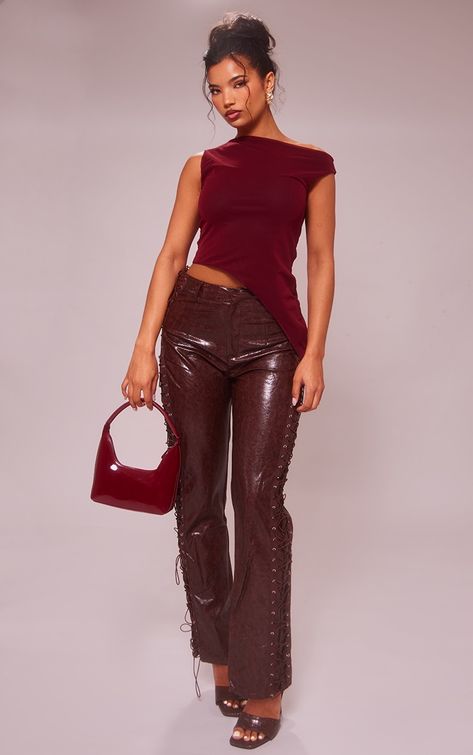 With PrettyLittleThing site searches showing a 42% uplift in the last week alone, burgundy is a must for AW24. Here are 5 ways to style burgundy this season! Silver And Red Outfit, Red Sheer Top, Burgundy Outfits, Faux Leather Trousers, High Waist Sports Leggings, Burgundy Outfit, Slip Top, Chiffon Dress Long, Clear Heels