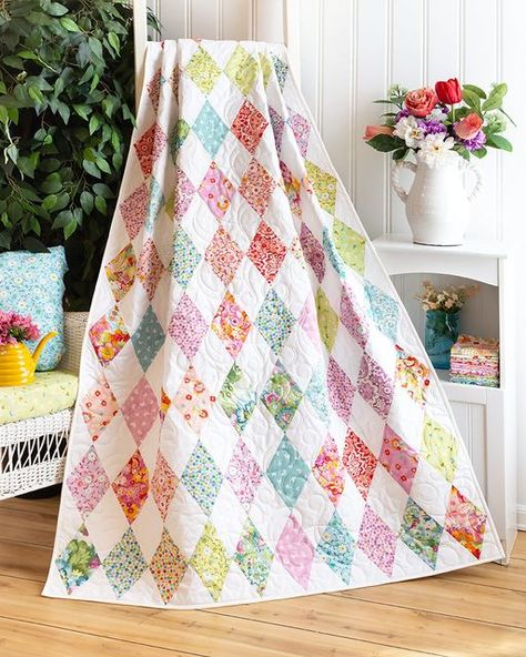 Shabby Fabrics on Instagram: "Bring the beauty of a garden inside with the Diamond Garden Quilt featuring the Jolie collection from Moda Fabrics United Notions. Enjoy the splendor of the vibrant prints that really pop off the white background. Achieving the diamonds is made easy and accurate using the Creative Grids USA Mini 60 Degree Diamond Ruler! Shop Jolie fabrics & kits in our link in bio! #shabbyfabrics #quiltshop #quilter #quilting #sewing #quilters #quiltinglove #ilovequilting #quilti Large Print Quilts, Diamond Quilts, Diamond Quilt Pattern, Sewing Seams, Fat Quarter Quilt, Laser Cut Kit, Birdhouse Designs, Marcus Fabric, Scrap Quilt