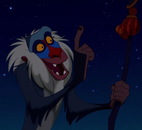 Rafiki is a supporting character in Disney's 1994 animated feature film The Lion King. He is a mandrill who serves as a shaman and Royal Mjuzi of the Pride Lands. Rafiki has an eccentricity that paints him as something of a lunatic; in truth, he is a sage with a deep connection to magical and spiritual elements. With his bakora stick always on his person, Rafiki uses his wisdom to guide those in need, most notably Simba. 1 Background 1.1 Personality 1.2 Physical Appearance 2 Appearances 2.1 The Disney Character Names, Rafiki Lion King, Lion King Ii, Lion King Timon, Young Simba, Lion King 1, Lion King Drawings, Lion King Movie, The Lion King 1994