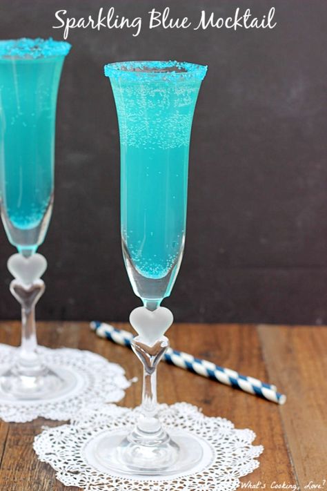 The 11 Best New Year's Eve Mocktail Recipes Blue Fruit Punch, Blue Mocktail, White Grape Juice, Cocktail Original, Virgin Drinks, Blue Fruit, White Grape, Blue Drinks, Sparkling Cider