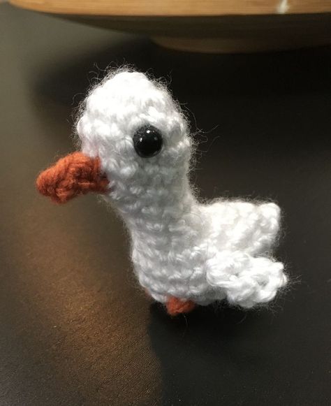 A mini goose based off the Untitled Goose Game Goose Crochet, Crochet Goose, Untitled Goose Game, Goose Game, Crafts Sewing Projects, Crochet Stuff, Crochet Top Pattern, Alpha Pattern, Alpha Patterns