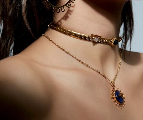 This ALLE Mysticus Choker by Mani Maalai offers a unique and modern style. Crafted from .925 silver with a 22k gold plate and featuring an intricately designed centerpiece, this piece will turn heads with its beautiful shimmer. An eye-catching choice that's sure to stand out. Gem: Citrine, lapislazuli, smoke quartz, carnelian, onyx. Metal: .925 silver with 22k gold plate Choker: 14 inches - Adjustable.#jewelrylover #handcraftedjewelry #jewelryinspiration #jewelrydesign #jewelryobsessed #jewelryoftheday #jewelrygoals #jewelryfashion #jewelrytrends Modern Gold Jewelry, Edgy Jewelry, Jewelry Lookbook, Funky Jewelry, Fantasy Jewelry, Gems Jewelry, Jewelry Inspo, Stylish Jewelry, Pretty Jewellery