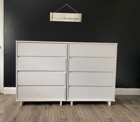 White dressers up against black bedroom wall Black Bedroom Wall, White Dressers, Black Walls Bedroom, White Chest Of Drawers, White Chest, White Dresser, Black Bedroom, House Decorating, Black Wall