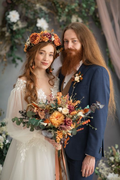 Large boho fall wedding bouquet The bouquet is made of artificial material, preserved material and other arranging material. Photo: Michaela Durisova photography Model: Valéria and Tibor Dress, suit: Svadobný salón Ľubica Matching earrings: https://www.etsy.com/uk/listing/1416814663/autumn-wedding-flower-earrings-circle?click_key=336fc67bc2f7f83656b32c29cf1d8b26c36c1ac5%3A1416814663&click_sum=c4fd0010&ref=shop_home_active_1&sts=1 Matching crown: https://www.etsy.com/uk/listing/1416649803/orange- Autumn Wedding Flower Crown, Fall Wedding Accessories, Cottage Core Wedding Bouquet, Fantasy Fall Wedding, Autumn Equinox Wedding, Autumn Bride Bouquet, Boho Wedding Bouquet Wildflowers, Rustic Boho Wedding Bouquet, Wedding Dresses Autumn