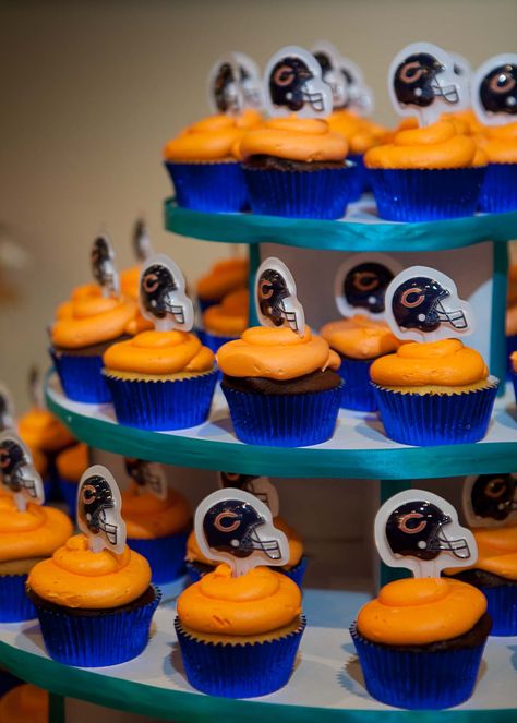 cupcakes with orange frosting in blue liner.  chicago bears emblem.    borterwagner photography    borterwagner.com Chicago Bears Cupcakes, Chicago Bears Party, Renew Vows Ideas, Sneaker Ball Ideas, Super Bowl Cupcakes, Super Bowl Cupcake, Birthday Cake For Men, Football Themed Party, Sports Cake