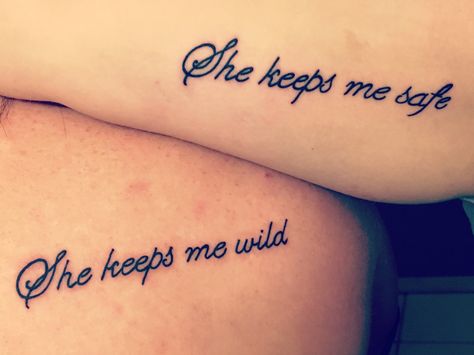 Best Friend Name Tattoo Ideas, Matching Saying Tattoos Best Friends, She Keeps Me Wild She Keeps Me Safe Tattoo, Love Her But Keep Her Wild Tattoo, Cousin Sister Tattoos, She Keeps Me Safe She Keeps Me Wild, You Keep Me Safe You Keep Me Wild Tattoo Couple, Soulmate Friend Tattoos, She Keeps Me Safe Tattoo