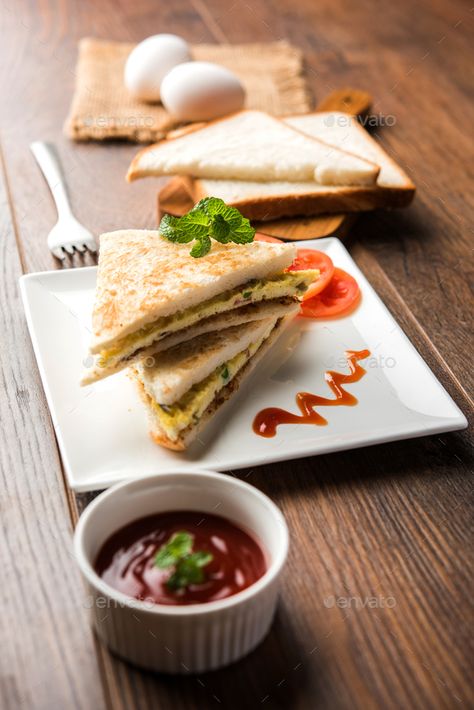 Bread Omelette Sandwich by stockimagefactory. Indian Style Bread Omelette Or Omelet sandwich served with tomato ketchup. Selective focus #Sponsored #stockimagefactory, #Indian, #Style, #Bread Omelet Photography, Bread Omlette Sandwich Video, Pakistani Omelette, Tomato Ketchup, Omelet, Easy Healthy Breakfast, Ketchup, Healthy Breakfast, Sandwiches