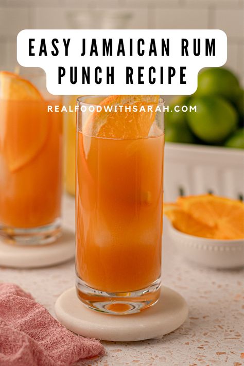 This Jamaican Rum Punch recipe is sure to transport you straight to a Caribbean Island. This tropical drink is made with just 6 ingredients and will be a huge hit at your next party. Jamaican Punch, Caribbean Rum Punch Recipe, Jamaican Rum Punch Recipes, Jamaican Rum Punch, Liquor Desserts, Jamaican Drinks, Rum Punch Recipe, Rum Punch Recipes, Berry Desserts