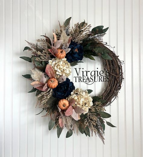 MADE TO ORDER.  This lush and beautiful wreath will make a great statement on your door! The gorgeous quality cream Hydrangeas, spiked ferns, foam pumpkin picks, eucalyptus leaves, cream flocked sprays & navy peonies give the wreath a classic and timeless style.  Made on an 18 inch grapevine wreath. Measures 20-24 inches in diameter.  Makes a special gift! All sales are final. No refunds or cancellations. Be sure to visit www.facebook.com/virgiestreasures and like page to see updates on new merc Wreaths For Fall Front Door, Fall Swag Wreaths For Front Door, Navy Fall Wreath, Monogram Wreaths For Front Door, Moody Wreaths, Modern Fall Wreaths For Front Door, Fall Door Wreaths, Elegant Fall Wreaths, Fall Hydrangea Wreath