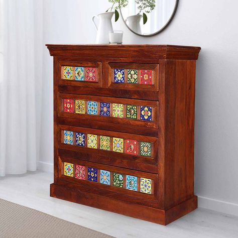 Invite color and a bit of fun into your home with expertly hand crafted rustic solid wood furniture. Our Dutch Farmhouse Rainbow Tiles Mango Wood 5 Drawer Dresser Chest stands directly on the floor on a simple base. This hardwood dresser is decorated with brightly colored tiles each with different colors and designs. The chest has three long drawers and two short top drawers. This floral tiled chest of five drawers is built with mango wood, a tropical hardwood grown as an eco-friendly renewable Dutch Farmhouse, Toddler Bed With Storage, Architectural Ceramics, Flip Furniture, Colored Tiles, Rainbow Tile, Swedish Blue, Rustic Farmhouse Furniture, Vintage Bedroom Furniture