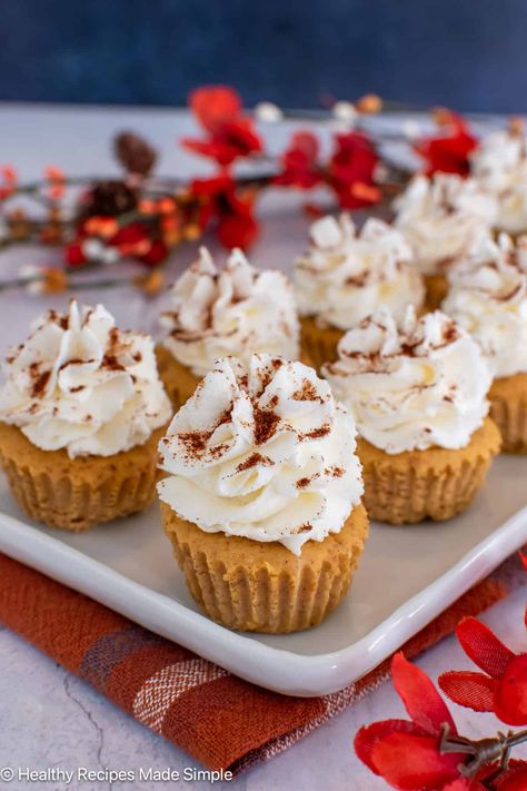 These mini pumpkin cheesecakes are creamy, low-carb, and perfect for the holiday season! With only a few ingredients and just 2 net carbs per bite, they’re a delicious keto treat everyone will love! Keto Pumpkin Cheesecake, Healthy Pumpkin Dessert, Spice Cheesecake, Pumpkin Cheesecakes, Pumpkin Pie Spice Recipe, Pie Spice Recipe, Mini Pumpkin Cheesecake, Pumpkin Spice Cheesecake, Pumpkin Cheesecake Recipes