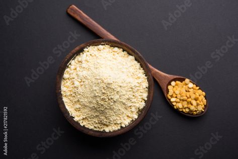 Stock Image: Besan, Gram or chickpea flour or powder is a pulse flour made from a variety of ground chickpea known as Bengal gram. popular ingredient for Pakora/pakoda or bajji snack. Selective focus Gram Flour, Chickpea Flour, Flour, Condiments, Snacks