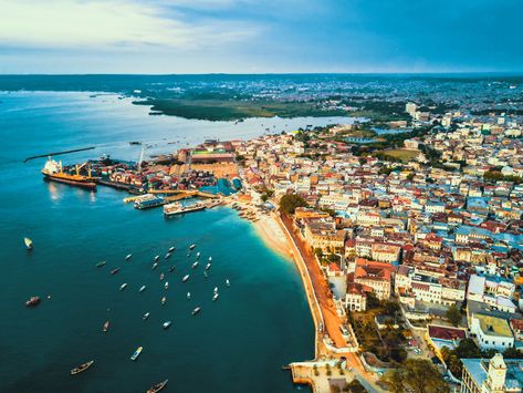 Port of Zanzibar from above, revealing Stone Town and its surroundings. #travel #Africa #Tanzania #Zanzibar #island #aerial #view #drone #image #photography #city #harbour #ocean #sea #boats Tanzania Photography, Stone Town Zanzibar, Zanzibar Beach, Zanzibar Travel, Best Islands To Visit, Zanzibar Beaches, Africa Vacation, Magical Landscape, Tanzania Travel