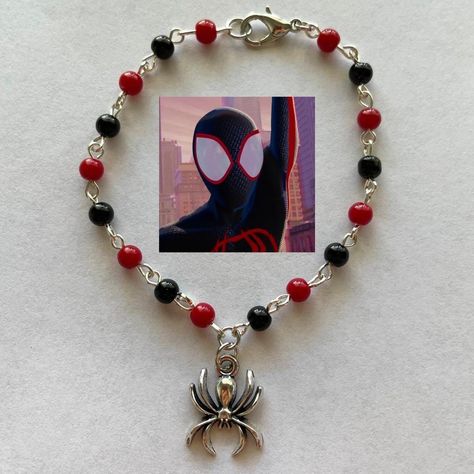 handmade miles morales spiderman bracelet ⭐️

handle... - Depop Spiderman Across The Spider Verse Bracelet, Spiderman 2099 Bracelet, Miles Morales Bracelet, Spider Man Charm Bracelet, Spider-man Bracelet Tutorial, Spiderman Bracelet, Miles Morales Spiderman, Handle With Care, Miles Morales