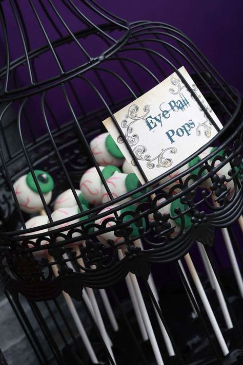 Eye ball pops in a bird cage Adams Family Cake, Haunted House Birthday Party, House Birthday Party Ideas, Eyeball Cake Pops, Eyeball Cake, House Birthday Party, Halloween Tricks, Cheap Clean Eating, Party Eyes