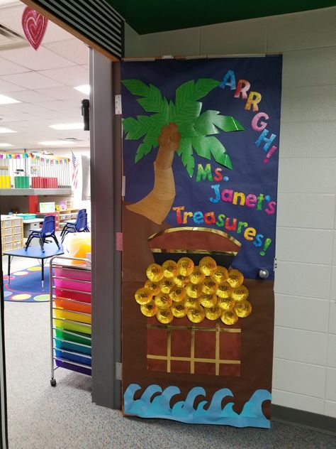 School door decorating for school carnival. Pirate themed. Pirates Of The Caribbean Door Decoration, Pirates Classroom Theme, Pirate Door Decoration, Pirate Door Decorations Classroom, Pirate Bulletin Board Ideas, Vbs Lighthouse, Pirate Bulletin Boards, Pirates School Theme, Pirate Door