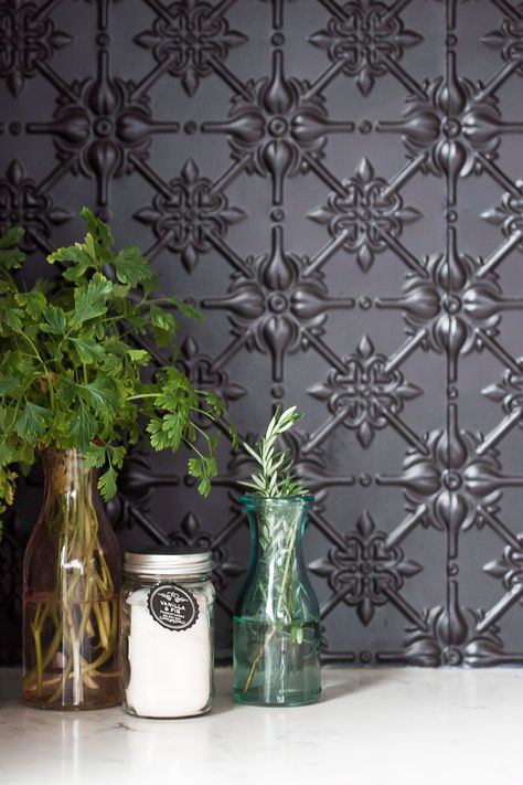 In the kitchen, a pressed tin splashback in matte black paint is a hero feature | Photography: Maree Homer #tininteriors Pressed Tin Kitchen Backsplash, Black And White Splashback, Pressed Metal Splashback Kitchens, Pressed Tin Splashback Kitchen, Black Tin Backsplash Kitchen, Black Splashback Kitchen, Kitchen Tile Splashback, Black Backsplash Kitchen, Pressed Tin Splashback