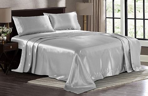 If you're pondering investing in satin sheets, it's imperative to first weigh their pros and cons. While these special sheets can be incredibly cooling and moisture-wicking, they unfortunately also come with a few crucial disadvantages that you should consider ahead of any purchase. Silky Bed Sheets, Silk Bed Sheets, Silk Sheets, Satin Bedding, Satin Sheets, Luxurious Bed, King Sheets, Hotel Luxury, Queen Sheets