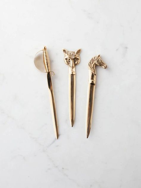 Rekindle the art of writing and opening letters with this handy and stylish sword letter opener. Whether used regularly or simply to add a classical touch as a desk ornament, this letter opener will serve as the ideal gift for the administrative or literary-minded friend in your life. #fathersday #fathersdaygiftideas #fathersdaygift #brass #brassdecor #letter #letters #letterwriting #letterwritingaesthetic #loveletters Desk Ornament, Quill Pen, Letter Openers, Vintage Pens, Letter Decor, Unique Pens, Letter Opener, Brass Decor, Letter Writing