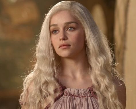 "Look at her. That silver-gold hair, those purple eyes...she is the blood of old Valyria, no doubt, no doubt" Master Illyrio, George RR Martin, A Game of Thrones, Bantam Books: New York, 1996, pp 27  SO FIT. Danearys Stormborn, Emilia Clarke, Game Of Thrones, Blonde Hair, A Woman, Blonde, Hair