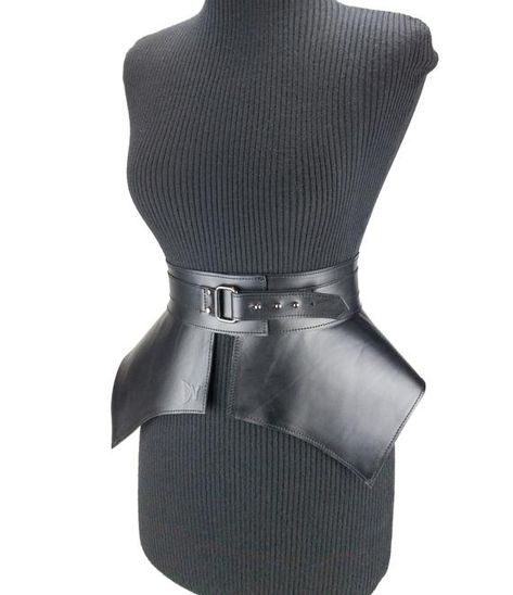 This wide waist belt with flared hips is made of stiff calf leather. Belt is designed with black metal hardware and is made to cinch the waist The upper portion of the belt width of 2.5 inches (6.5 cm) This adjustable belt is fastening on rectangular metal ring and screw rivets Pair up belt with a Plus Size Belt, Peplum Belt, Leather Obi Belt, Black Leather Corset, Wide Waist Belt, Leather Corset Belt, Leather Peplum, Plus Size Belts, Sleek Dress