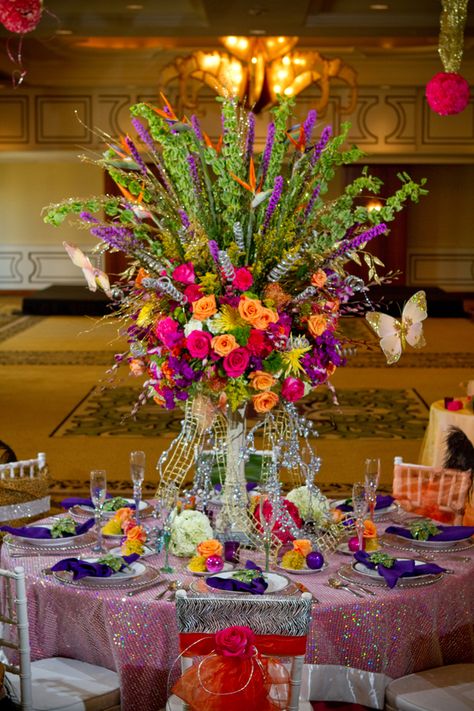 Carnivale Decor - Spring 2012 Issue of N.O.W. Magazine | styled by Get Polished Events | NOLA Flora | Loews New Orleans Hotel | Nuance New Orleans (champagne flutes) | Event Rental New Orleans Wedding Decor, New Orleans Wedding Table Decor, Mardi Gras Flower Arrangements, Mardi Gras Floral Centerpieces, Mardi Gras Wedding Theme, New Orleans Wedding Bouquet, New Orleans Party, Mardi Gras Wedding, Mardi Gras Centerpieces