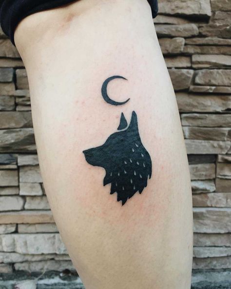 A black wolf and crescent moon tattoo inked on the right calf Wolf Moon Tattoo, Wolf Pack Tattoo, Wolf And Moon Tattoo, Howling Wolf Tattoo, Three Wolf Moon, Moon Tattoo Ideas, Small Wolf Tattoo, Wolf And Moon, Wolf Tattoo Sleeve