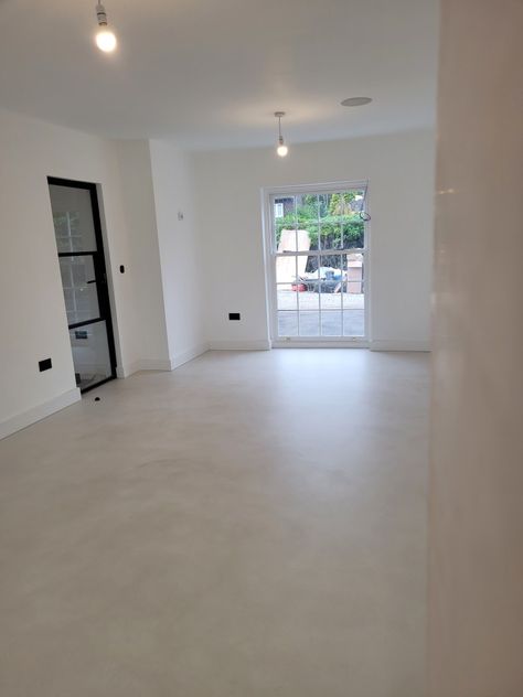 Beautiful effect to a large ground floor area, finished with satin sealer. Concrete White Floor, Matte Concrete Floors, Matte Concrete Floors In House, Beige Concrete Floors, Limewash Concrete Floor, Concrete Floor Colors, Micro Cement Floor, Gray Wood Floors, Concrete Floors Bedroom