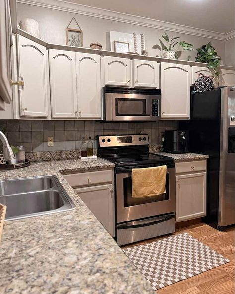 Newly renovated kitchen. Single Wide Kitchen Remodel, Square Tile Backsplash, Wide Kitchen, Grey Blue Kitchen, Kitchen Cost, Kitchen Countertop Decor, Renovated Kitchen, Cabinet Paint, Countertop Decor