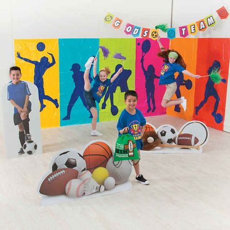 Large Sports Backdrop Banner - 6 Pc. | Oriental Trading Sports Backdrop Ideas, Sports Decorations School, Sport Day Decoration Ideas, Preschool Sports Theme, Olympic Vbs, Scenarios Ideas, Sports Day Banner, Sports Backdrop, Sports Vbs