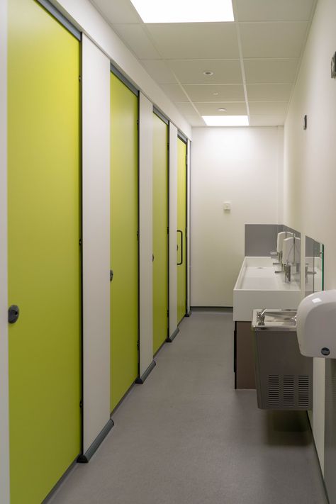 Ultimate privacy was imperative when specifying the primary school toilets for the unisex washroom areas. Julian chose Bushboard’s HiZone toilet cubicles in Zest green and Arctic White. HiZone is a full height toilet cubicle with partitions sitting in durable aluminium skirting at floor level, the ideal choice for full privacy within a unisex washroom area. Julian explained ‘careful planning and good facilities discourage chances of bullying’. School Toilet Design, School Bathroom Design, Toilet Cubicle Design, Hospital Toilet, Public Toilet Design, School Washroom, School Toilet, School Restroom, Bathroom School