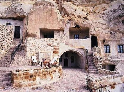 There’s nothing more organic than a home that blends in flawlessly with its environment. Whether it be mountains, rocks or trees, these awesome homes fit right in. Cave Hotel, Old Stone Houses, Underground Homes, Cave House, Unusual Homes, Earth Homes, Volcanic Rock, Old Stone, Stone Houses