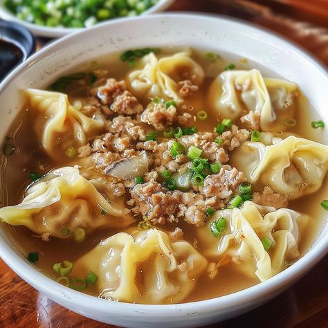 🍜 Warm up with a bowl of Pancit Molo, the Filipino Wonton Soup! 🍜 #PancitMolo #FilipinoCuisine Pancit Molo (Filipino Wonton Soup) Ingredients: Ground pork (1 lb) Shrimp (1/2 lb, peeled and chopped) Garlic (3 cloves, minced) Onion (1, finely chopped) Egg (1, beaten) Salt (1 tsp) Pepper (1/2 tsp) Wonton wrappers (30 pcs) Chicken broth (8 cups) Fish sauce (2 tbsp) Spring onions (for garnish) Fried garlic (for garnish) Instructions: In a bowl, mix ground pork, shrimp, garlic, onion, egg, salt... Pancit Molo, Fried Garlic, Minced Pork, Soup Ingredients, Instagram Recipes, Twisted Recipes, Wonton Wrappers, Garlic Fries, Spring Onions