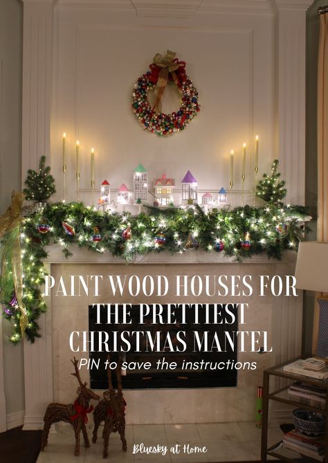 Use this easy DIY Mantel Idea for Christmas. Learn how to paint and embellish wood houses to add color and whimsy to your mantel. Create your custom houses to give your holiday mantel a special glow for the Christmas season. Simple Elegant Christmas Mantel, Mantels Decorated For Christmas, Elegant Simple Christmas Mantel, White Village Christmas Houses Mantle, Mantels Decorated, Christmas Fireplace Mantel Scarf, Christmas Mantel Scarf, Diy Christmas Mantel, Diy Mantel