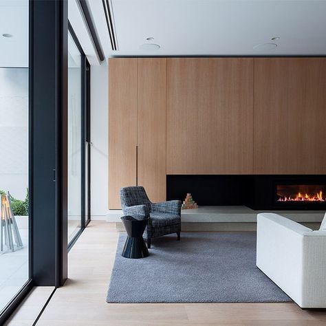 Stoke Fireplace Studio’s Instagram photo: “We're loving the contrast between this concrete hearth & timber wall paneling – how good @matyasarchitects 👌 Fire by @escea_fireplaces . .…” Concrete Hearth, Melbourne Home, Timber Walls, Melbourne House, Studio S, Wall Paneling, Melbourne, Room Divider, Dream House