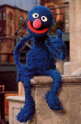 Sesame Street - Grover is a  "valiant, caring blue monster" who has an instructional persona, wears a cap and gown to provide educational context for simple, everyday things. His lessons are often wrong, leaving himself open to correction by a group of kids or Muppets. Grover has a semi-secret superhero identity as the well-meaning but inept Super Grover, sometimes presented as the alter ego of Grover Kent, "ace doorknob salesman for Acme, Inc.". Beto Y Enrique, Die Muppets, Brian Froud, Sesame Street Muppets, Sesame Street Characters, Fraggle Rock, The Muppet Show, Kermit The Frog, Thomas Kinkade