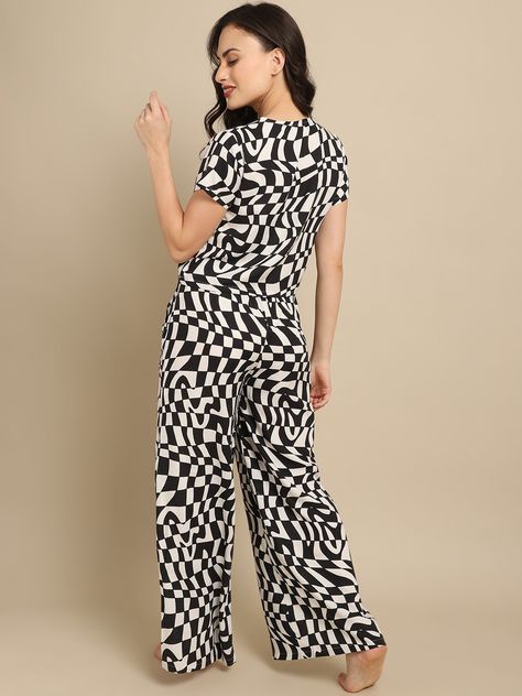 Black and white checkered co-ord set is a stylish and coordinated ensemble that offers a timeless and classic look. It can be worn for various occasions, including casual outings, parties, or even semi-formal events. #claura #clauradesigns #casualwear #loungeset #comfort #casuallook #coordsets #claurainnerwear #clauranightwear #claurafashion Co Ord Set, Co Ord, Lounge Sets, Semi Formal, Formal Event, Classic Looks, Casual Wear, Casual Looks, Black And White