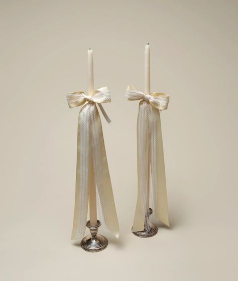 Dramatic and towering, this hand-dipped taper candle features a layered satin and lace bow.   24 inches tall.  New Color: Ivory & Cream (coming soon) Tafel Decor, Ribbon White, White Candle, Wedding Mood Board, Lace Bows, Wedding Mood, White Candles, 가을 패션, Rehearsal Dinner