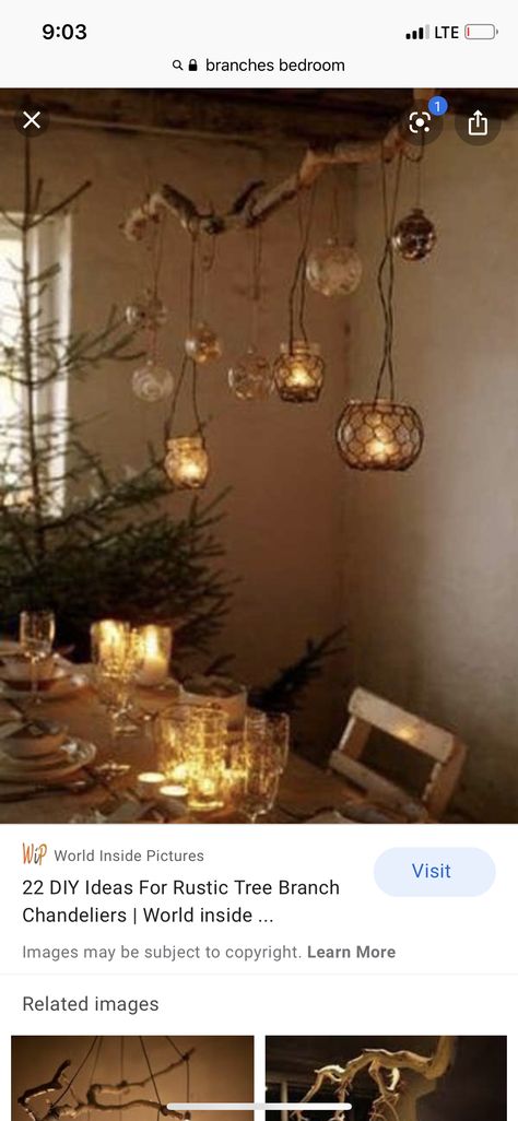 Hanging Branch Over Dining Table, Branch Chandelier Dining Room, Witchy Ceiling Decor, Hanging Branch Decor, Greenwood Furniture, Classroom Ceiling, Branch Lights, Fairy Lights In Trees, Romantic Living Room